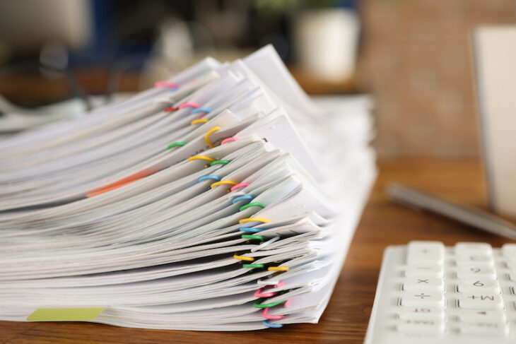 stack of paperwork for archiving