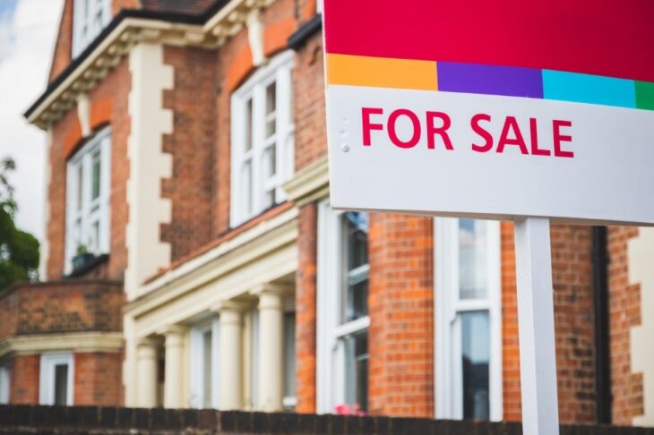 For sale sign outside a house