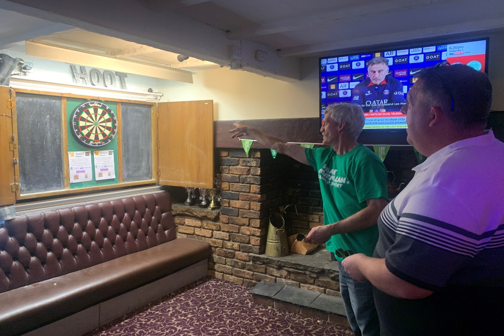 Bruce and Lee playing darts at the Hooton Arms